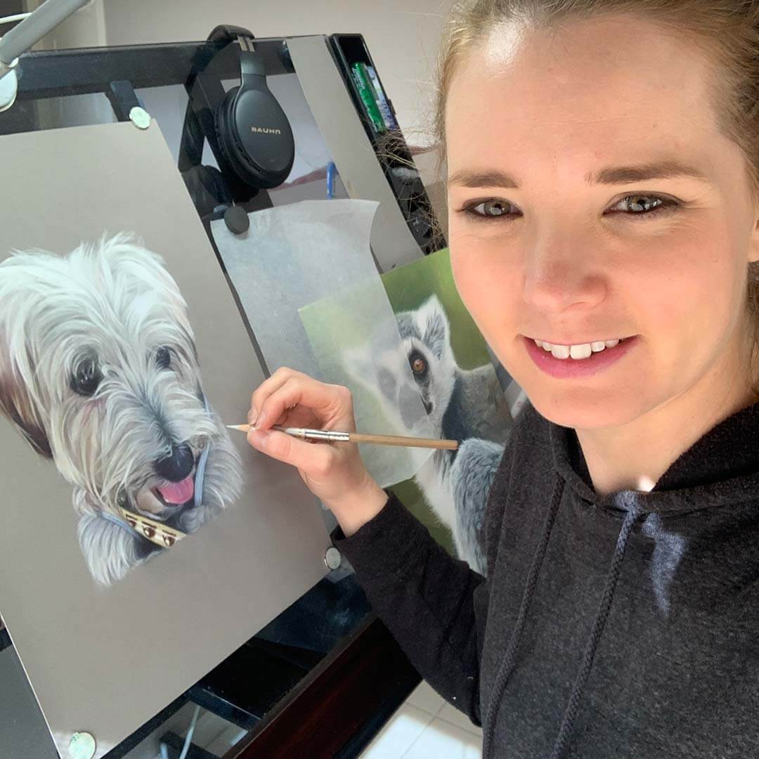 Sandra Edwards drawing a pet portrait in her studio